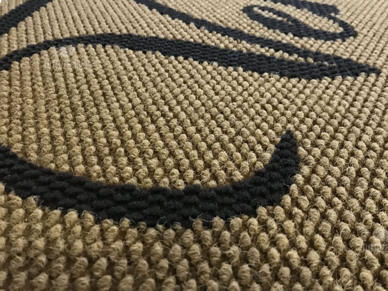 Come si intarsia il logo in uno zerbino